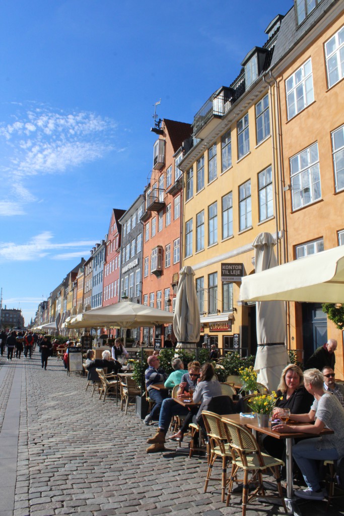 Nyhavn - relaxed atmosphere on outdoor restaurants on "sunny" side of Nyhavn